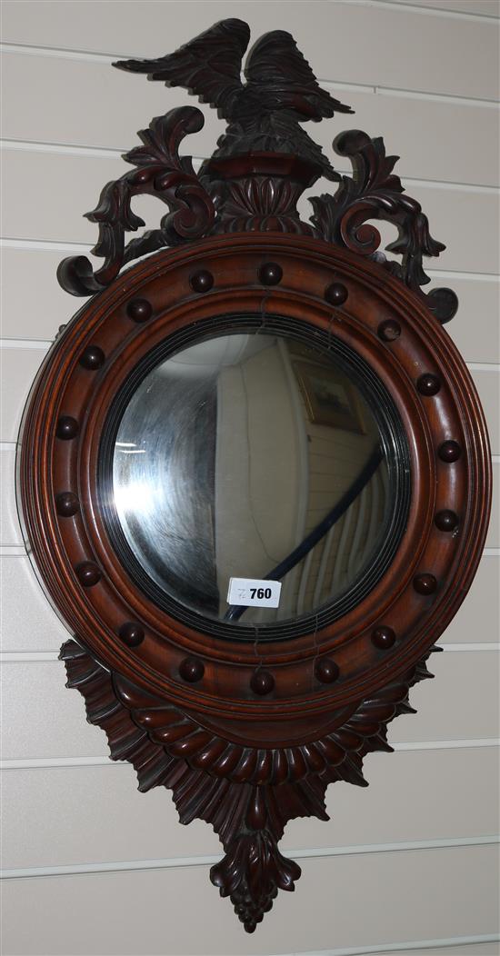 A Regency style mahogany convex wall mirror